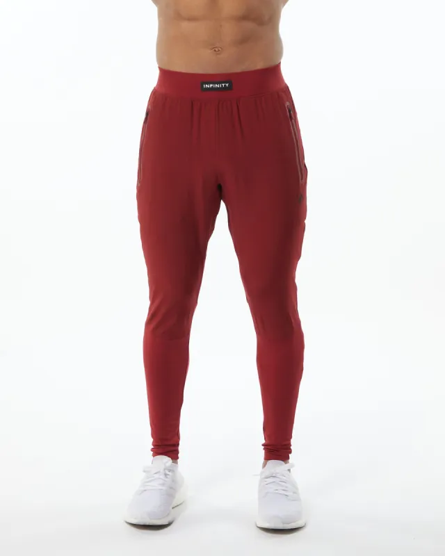 Infinity Tech Pant - Tartan Red sold by Alphalete