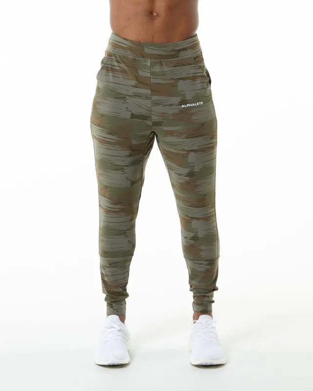 Trace Jogger - Olive Canvas Camo sold by Alphalete