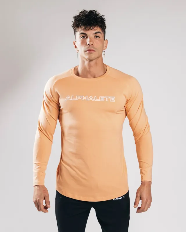 Outlined Performance LS Tee - Orange Frost sold by Alphalete