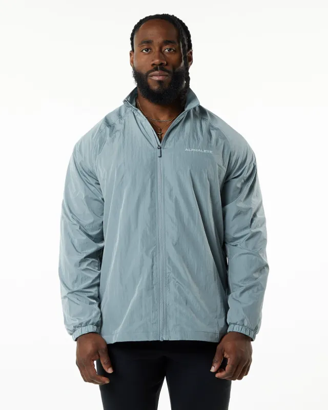 Endure Zip Jacket - Steel Blue sold by Alphalete
