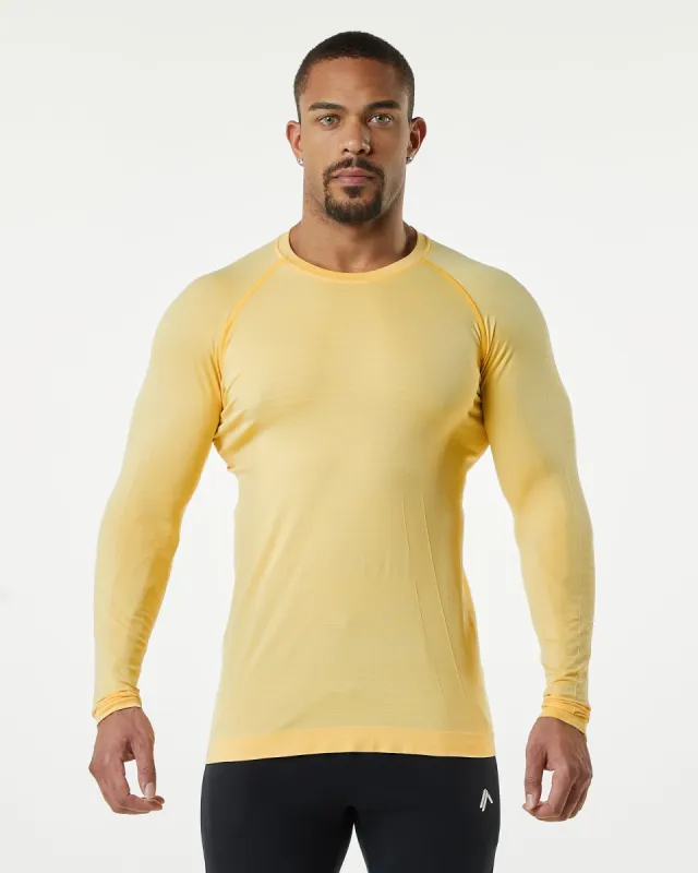 Hero Long Sleeve Tee - Faded Honey sold by Alphalete