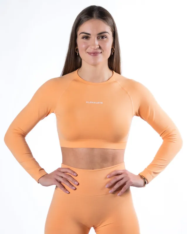 Amplify LS Crop - Cheeky Coral sold by Alphalete