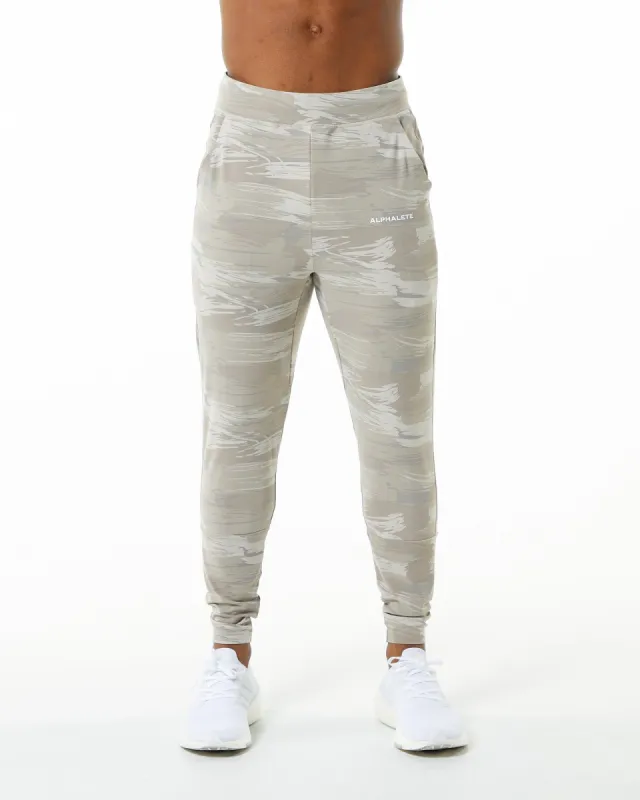 Trace Jogger - Desert Canvas Camo sold by Alphalete