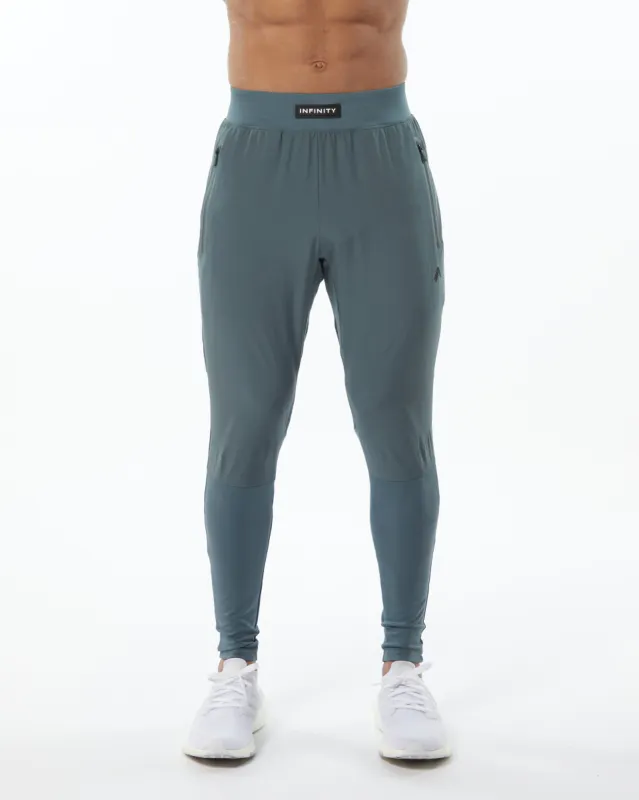 Infinity Tech Pant - Porcelain Grey sold by Alphalete