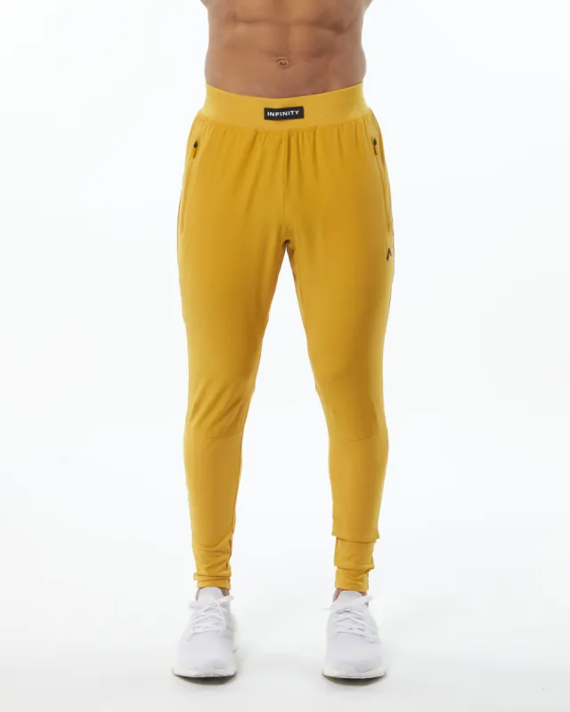 Infinity Tech Pant - Exotic Yellow sold by Alphalete