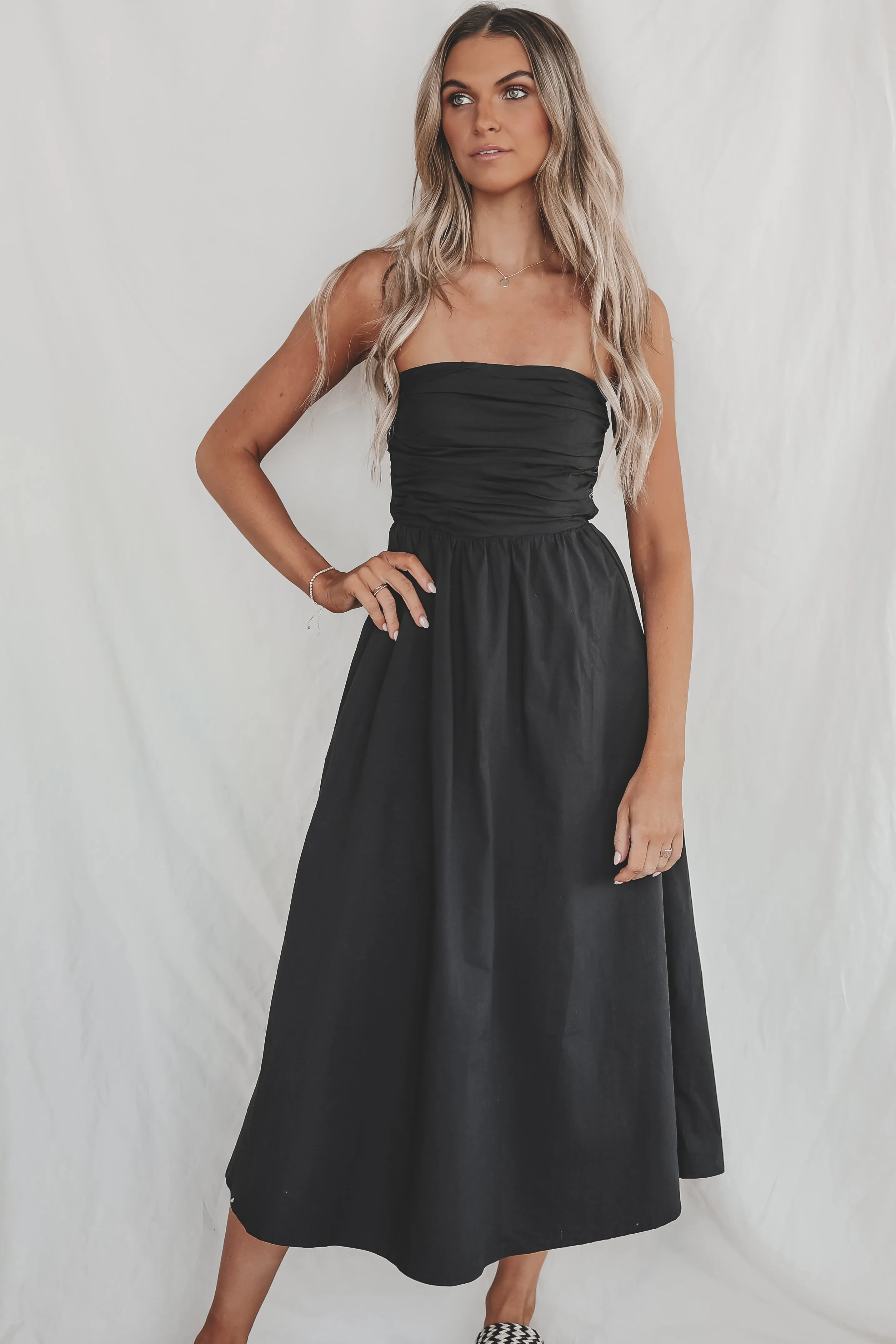 When On Vacation Black Strapless Maxi Dress sold by Amazing Lace