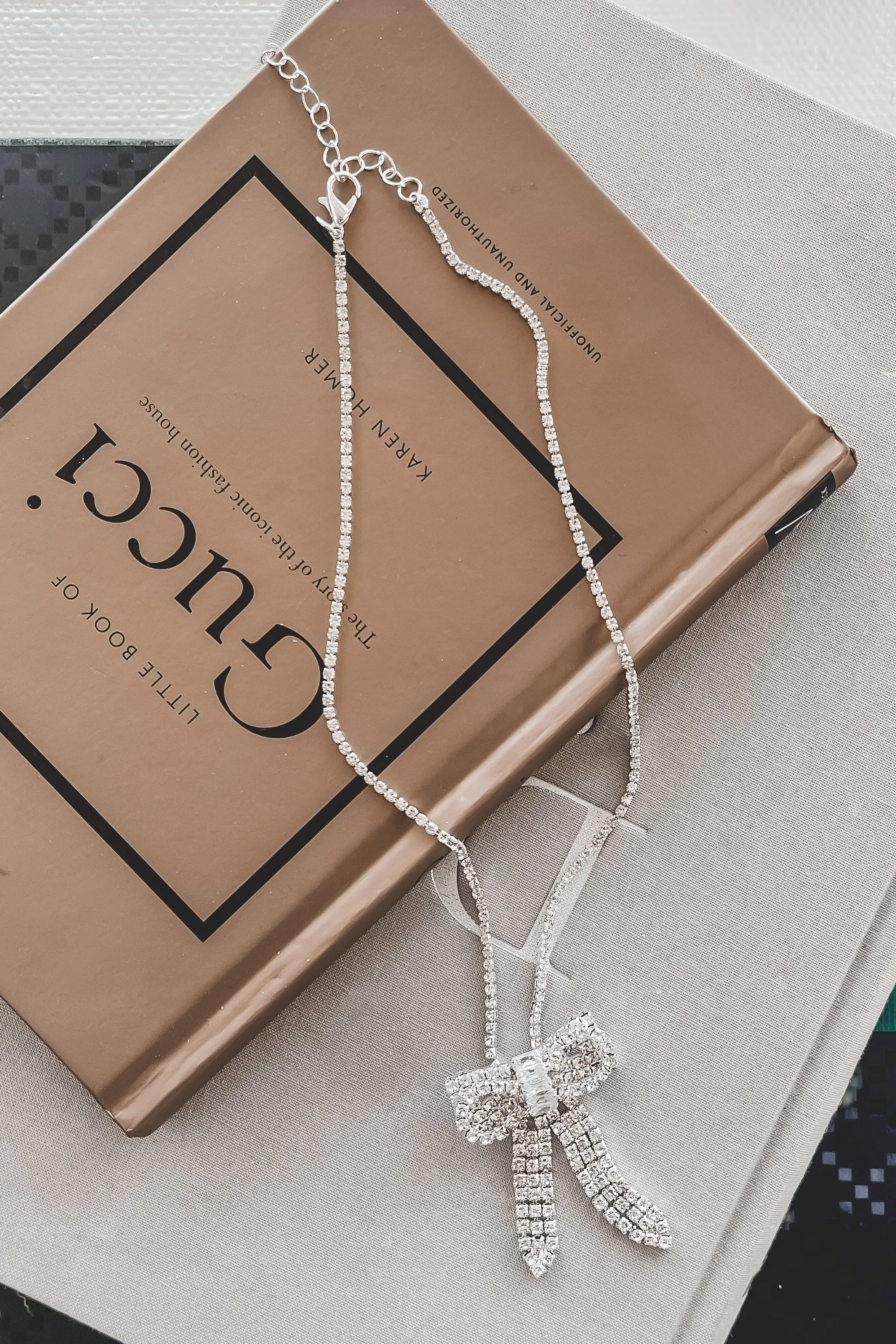 DEAL Right Time Rhinestone Bow Necklace sold by Amazing Lace product image thumbnail 2