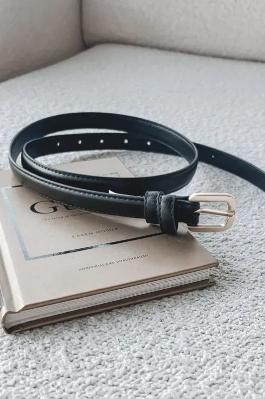 Looking Extra Faux Leather Skinny Belts sold by Amazing Lace