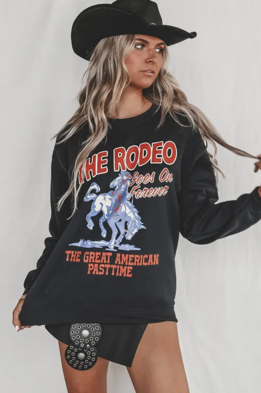 The Rodeo Goes On Black Pullover sold by Amazing Lace