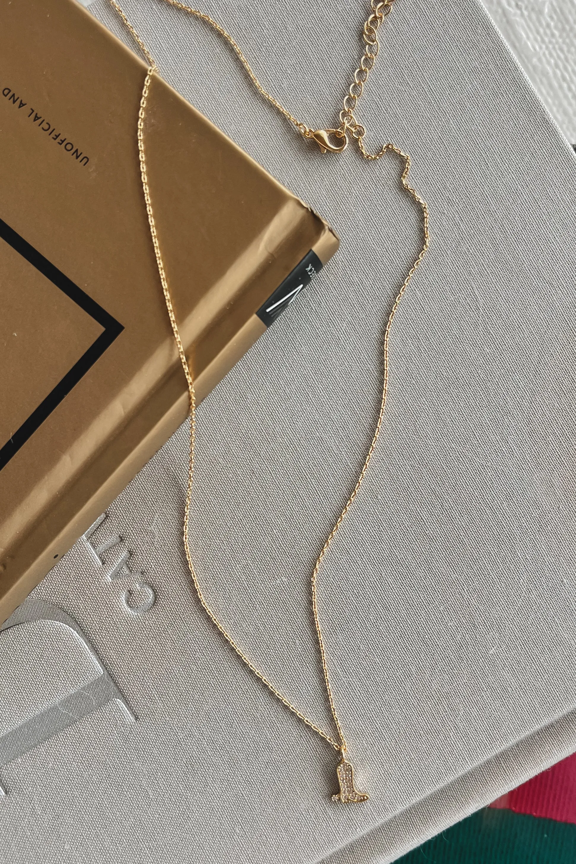 My Cowboy Way Gold Rhinestone Boot Necklace sold by Amazing Lace product image thumbnail 2