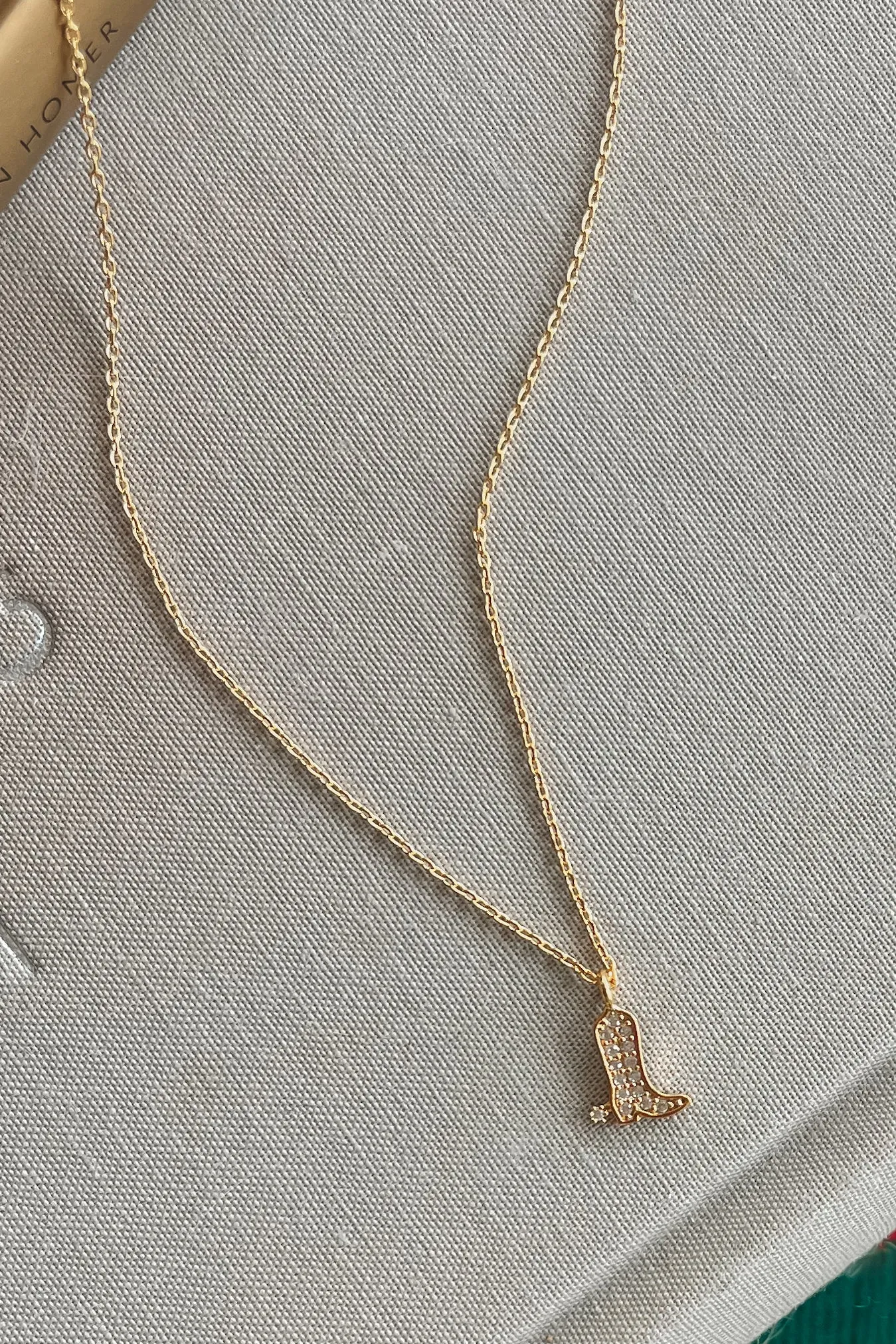 My Cowboy Way Gold Rhinestone Boot Necklace sold by Amazing Lace