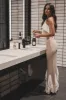 A Sunset Walk Taupe Ruffle Maxi Dress sold by Amazing Lace
