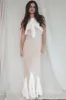 A Sunset Walk Taupe Ruffle Maxi Dress sold by Amazing Lace
