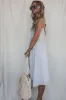 SADIE & SAGE Bird Song Smocked Midi Dress sold by Amazing Lace