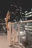 DEAL Room Full Of Stars Champagne Sequin Flares sold by Amazing Lace