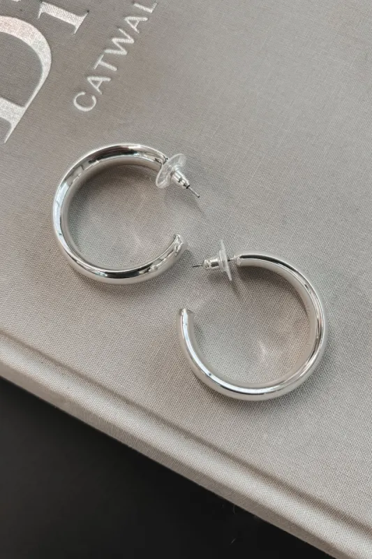 Saw Them Had To Have Them Silver Hoops sold by Amazing Lace