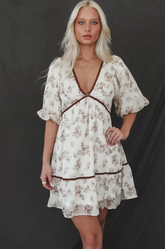 This Little Cutie Cream Floral Dress sold by Amazing Lace