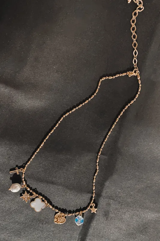 Turning On The Charm Multi Charm Necklace sold by Amazing Lace