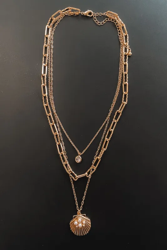 The Sea Is Calling Gold Shell Layered Necklace sold by Amazing Lace