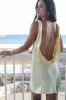 The Andie Anderson Yellow Satin Open Back Dress sold by Amazing Lace