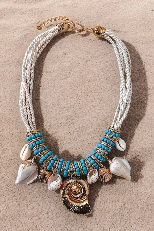 Shoreline Summer Turquoise Sea Shell Charm Necklace sold by Amazing Lace