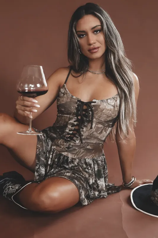 Calling The Country Camo Lace Up Romper sold by Amazing Lace