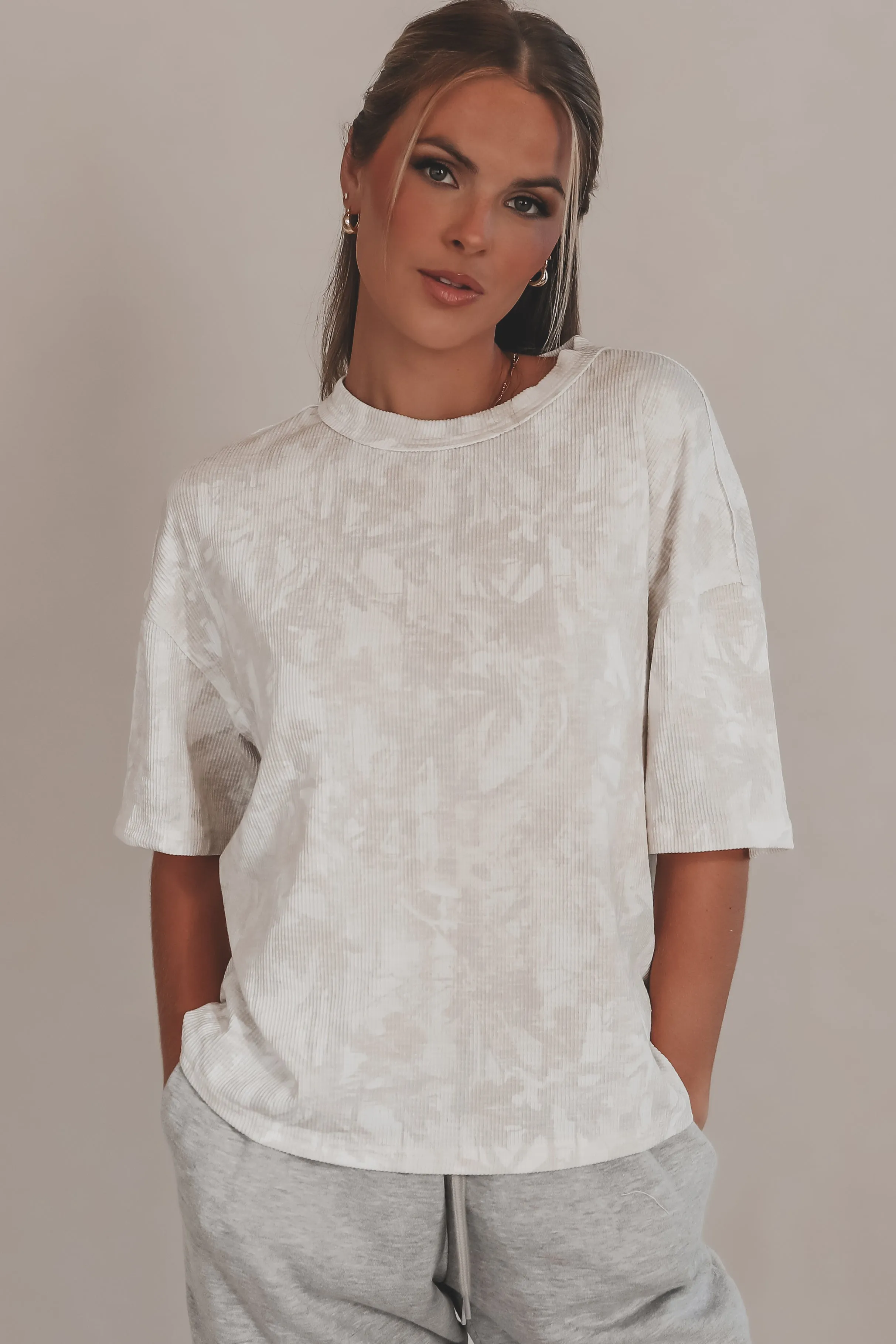 Can You See How Cute You Look Light Wash Camo Top sold by Amazing Lace