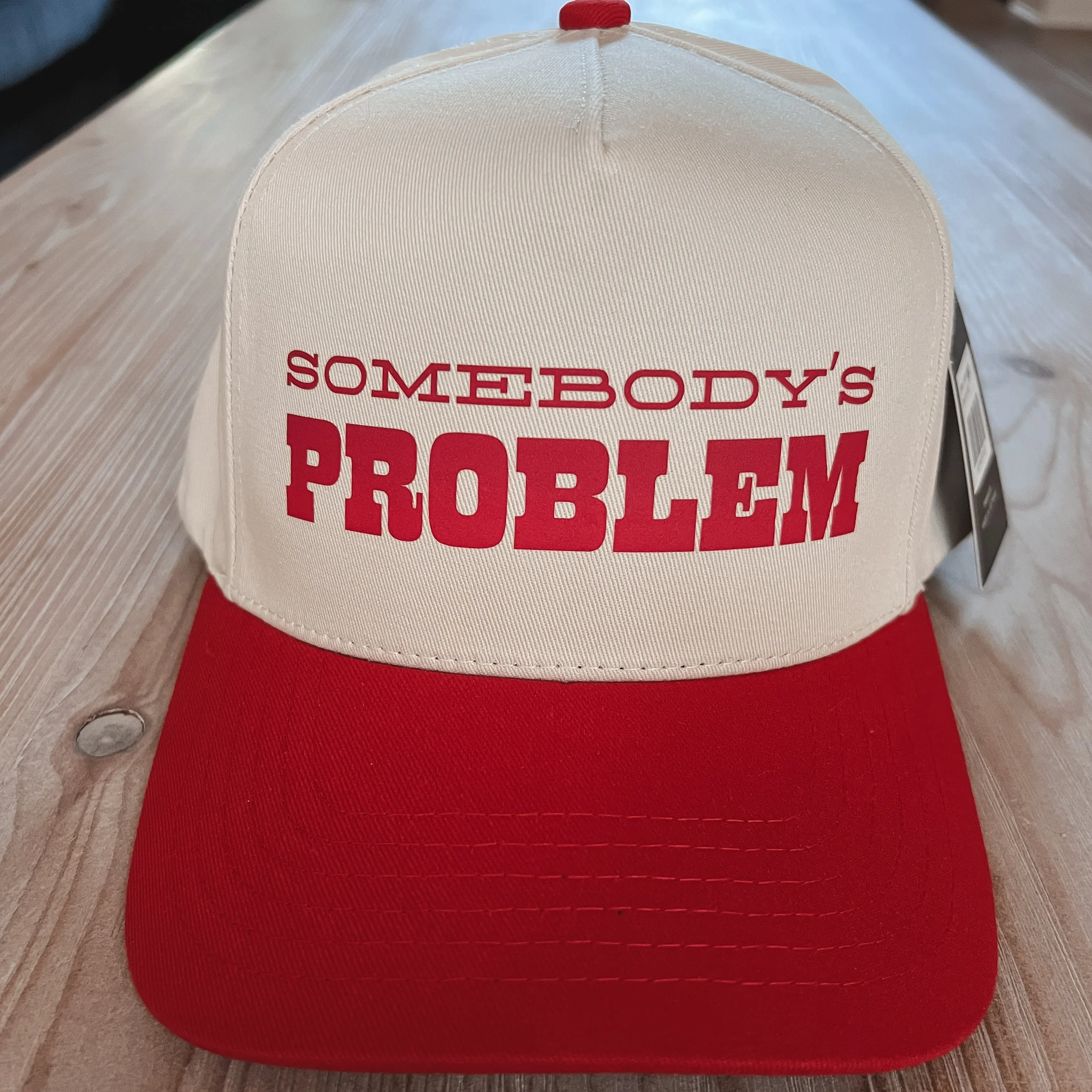 Somebody’s Problem Country Girl Trucker Hat sold by Amazing Lace