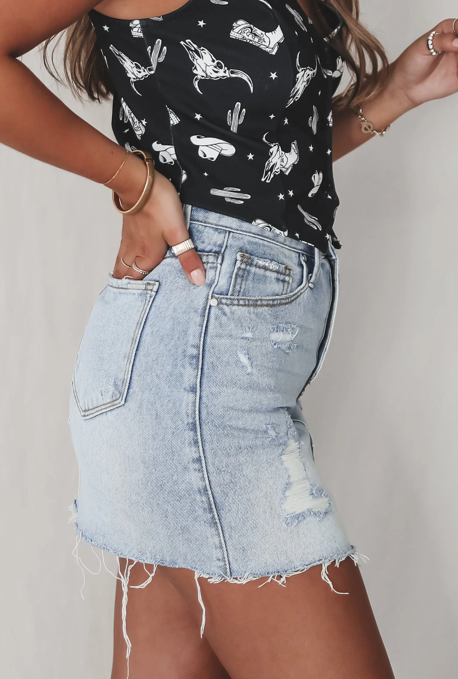 DEAL Cooler Than The Average Denim Distressed Mini Skirt sold by Amazing Lace product image thumbnail 5