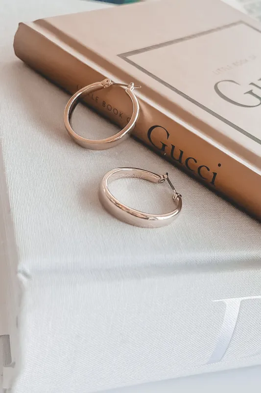 They Go With Everything Gold Hoops sold by Amazing Lace