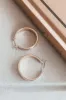 They Go With Everything Gold Hoops sold by Amazing Lace