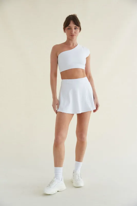 Avery Smoothing Flare Tennis Skort in White made by American Threads