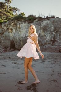 Cara Floral Eyelet Flutter Sleeve Babydoll Mini Dress sold by American Threads