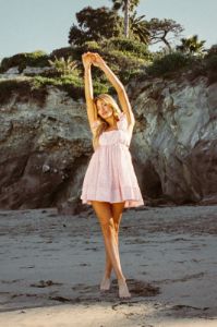 Cara Floral Eyelet Flutter Sleeve Babydoll Mini Dress sold by American Threads