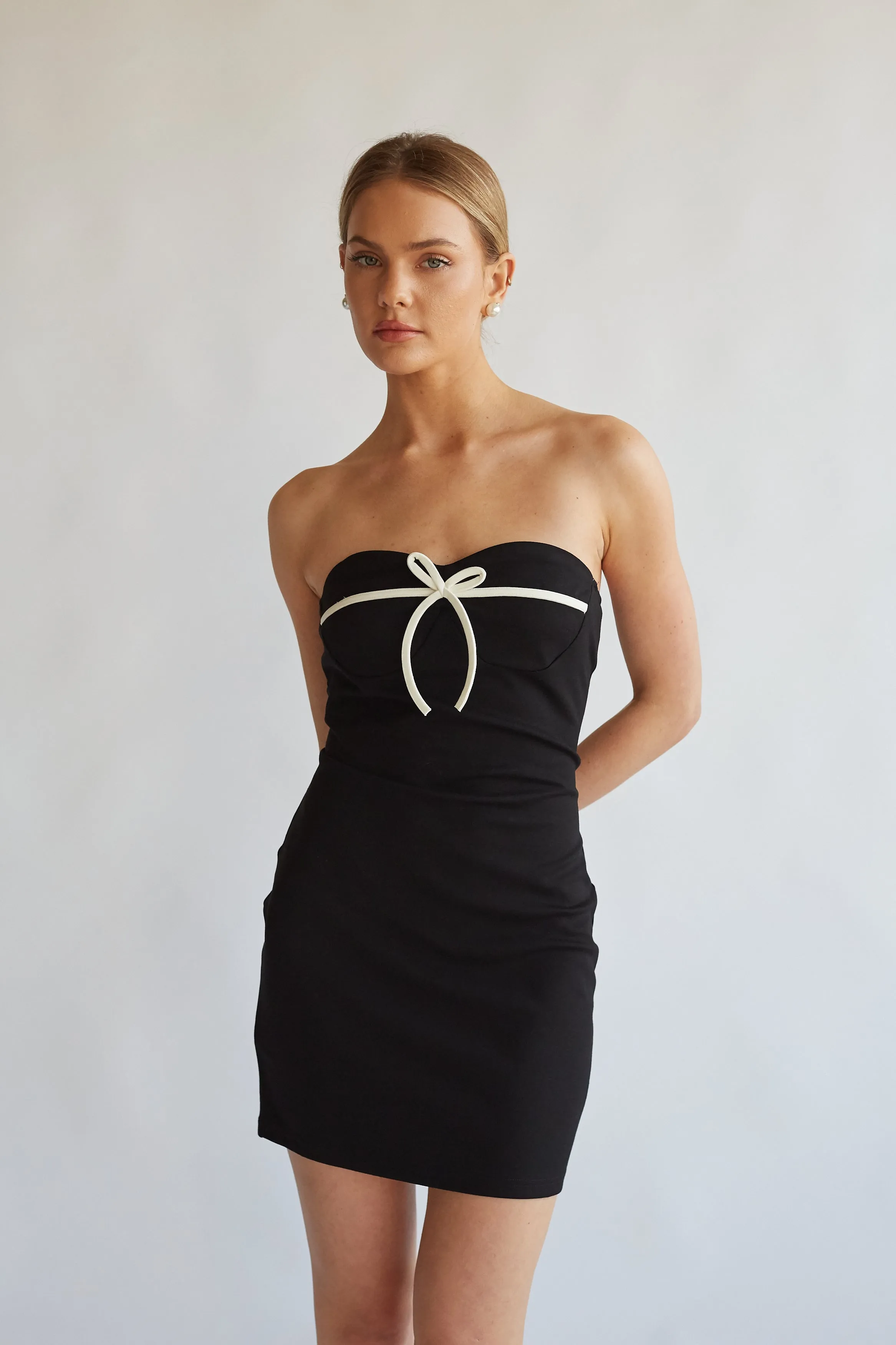 Eloise Strapless Bow Bodycon Mini Dress sold by American Threads product image thumbnail 5