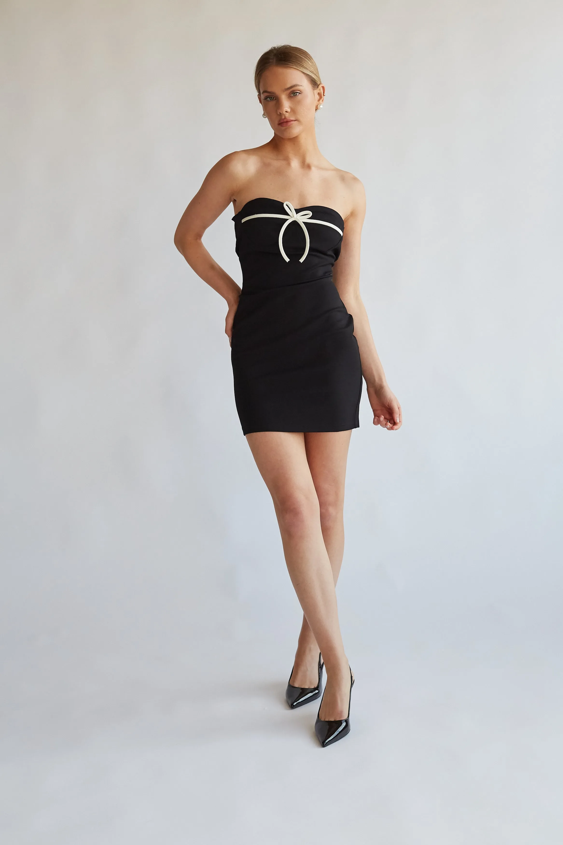 Eloise Strapless Bow Bodycon Mini Dress sold by American Threads product image thumbnail 4