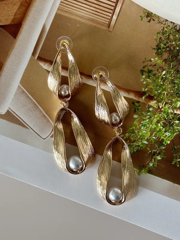 Ondine Pearl Drop Studs sold by American Threads