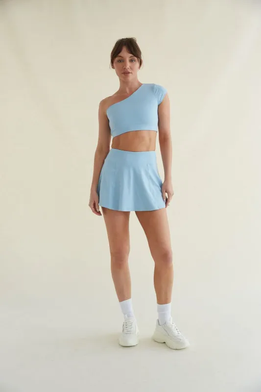 Avery Smoothing Flare Tennis Skort in Blue made by American Threads