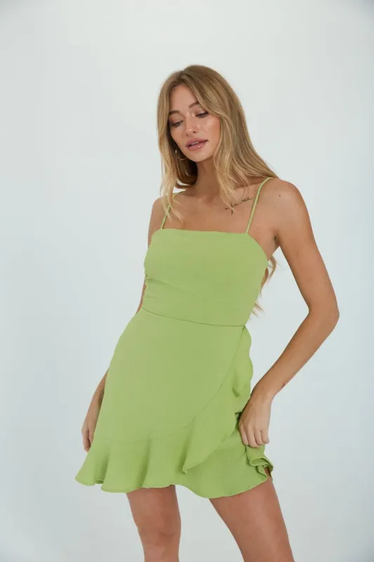 Audra Ruffle Wrap Dress in Green sold by American Threads
