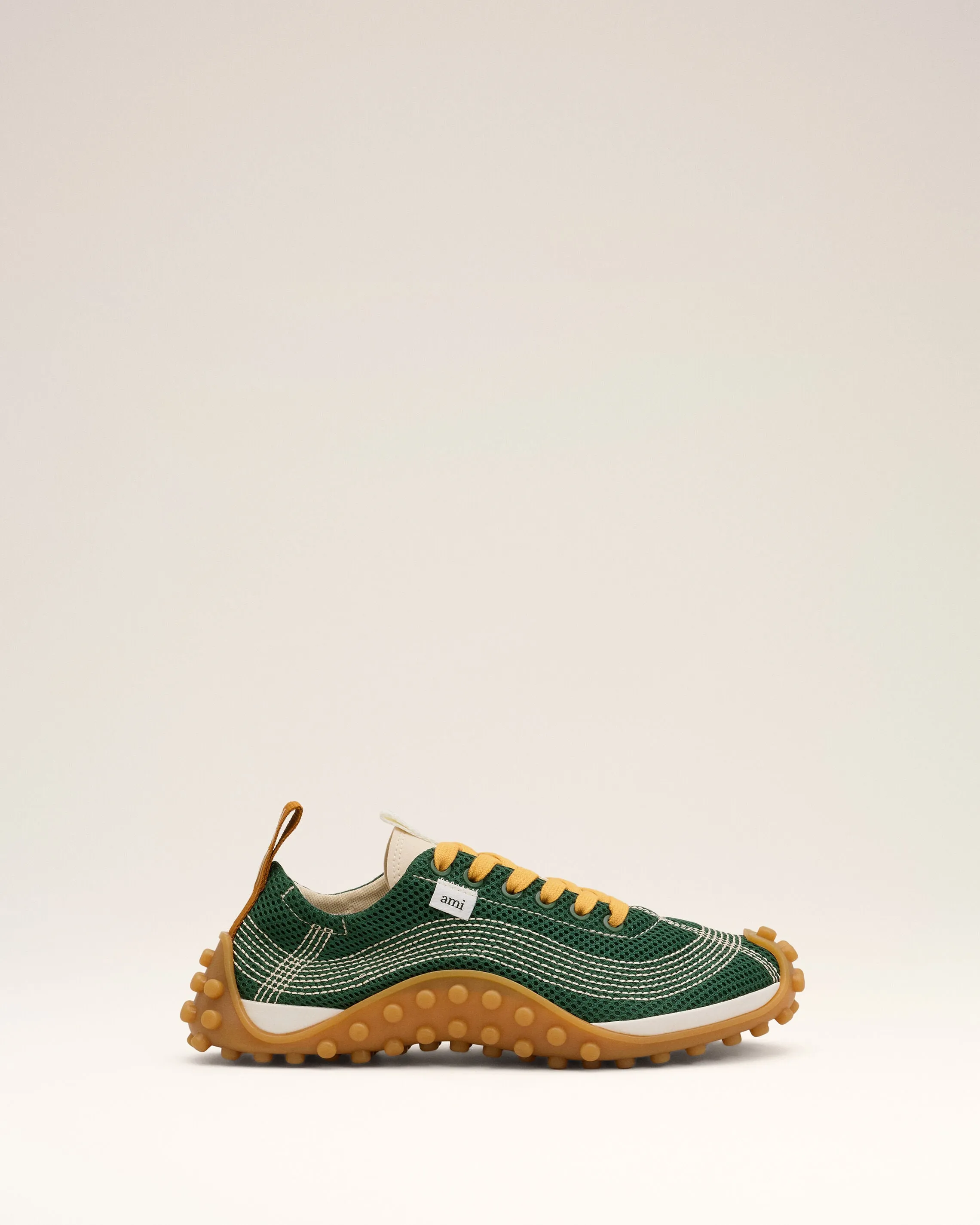 Sneakers Mirage vertes en mesh sold by Ami