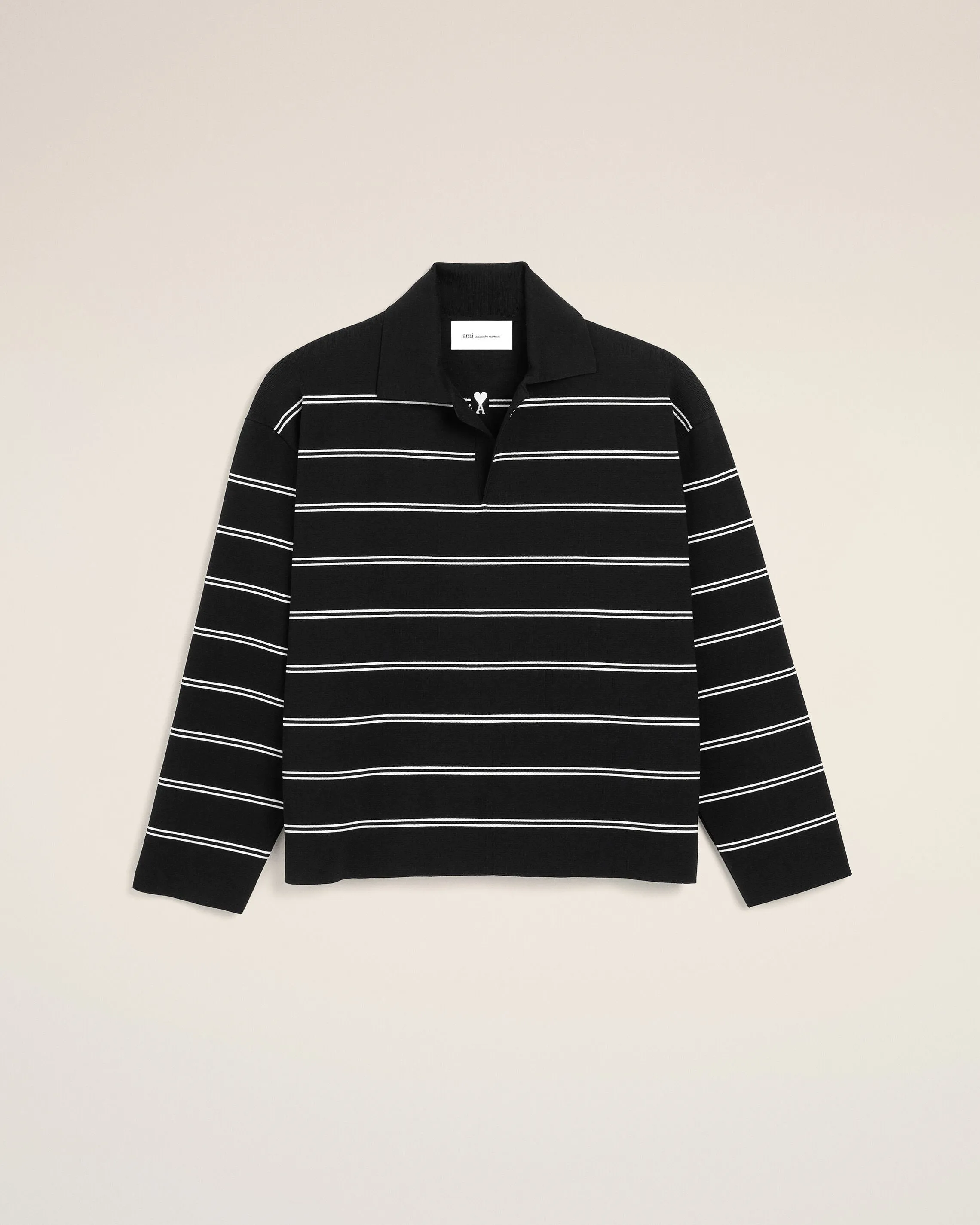 Polo noir à rayures en coton patch Ami sold by Ami