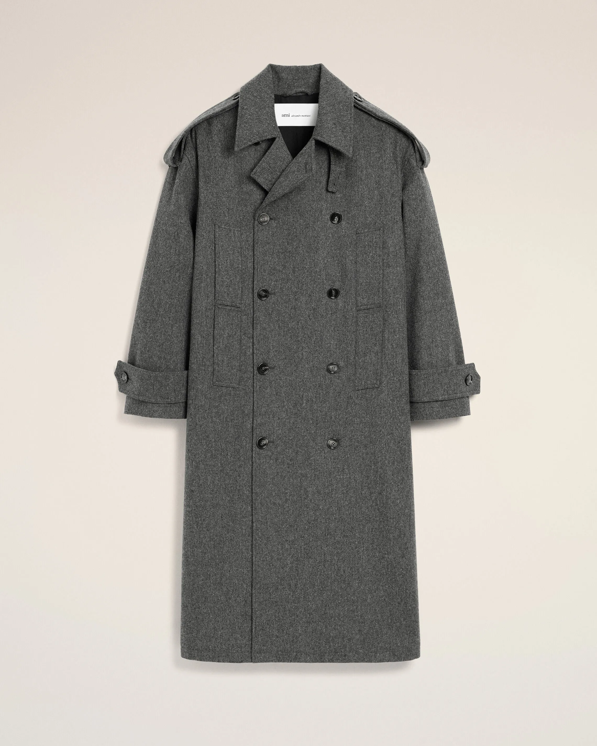 Trench coat gris en laine sold by Ami