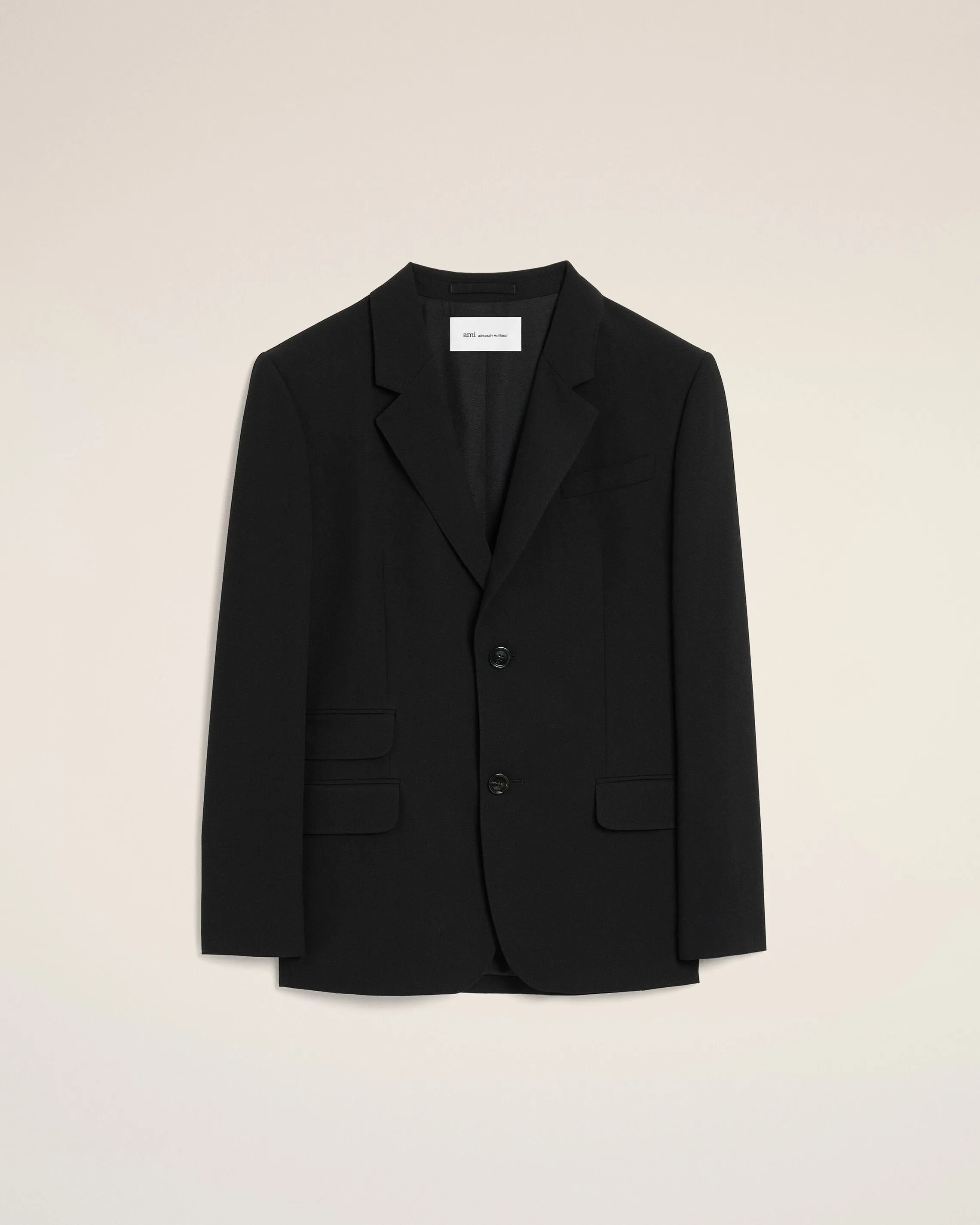 Veste droite noire simple boutonnage en laine sold by Ami
