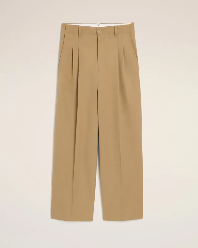 Pantalon beige coupe carotte taille haute en coton et lin made by Ami