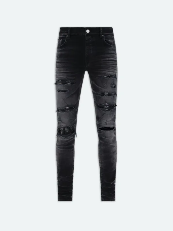 SEQUIN THRASHER JEAN - FADED BLACK sold by AMIRI