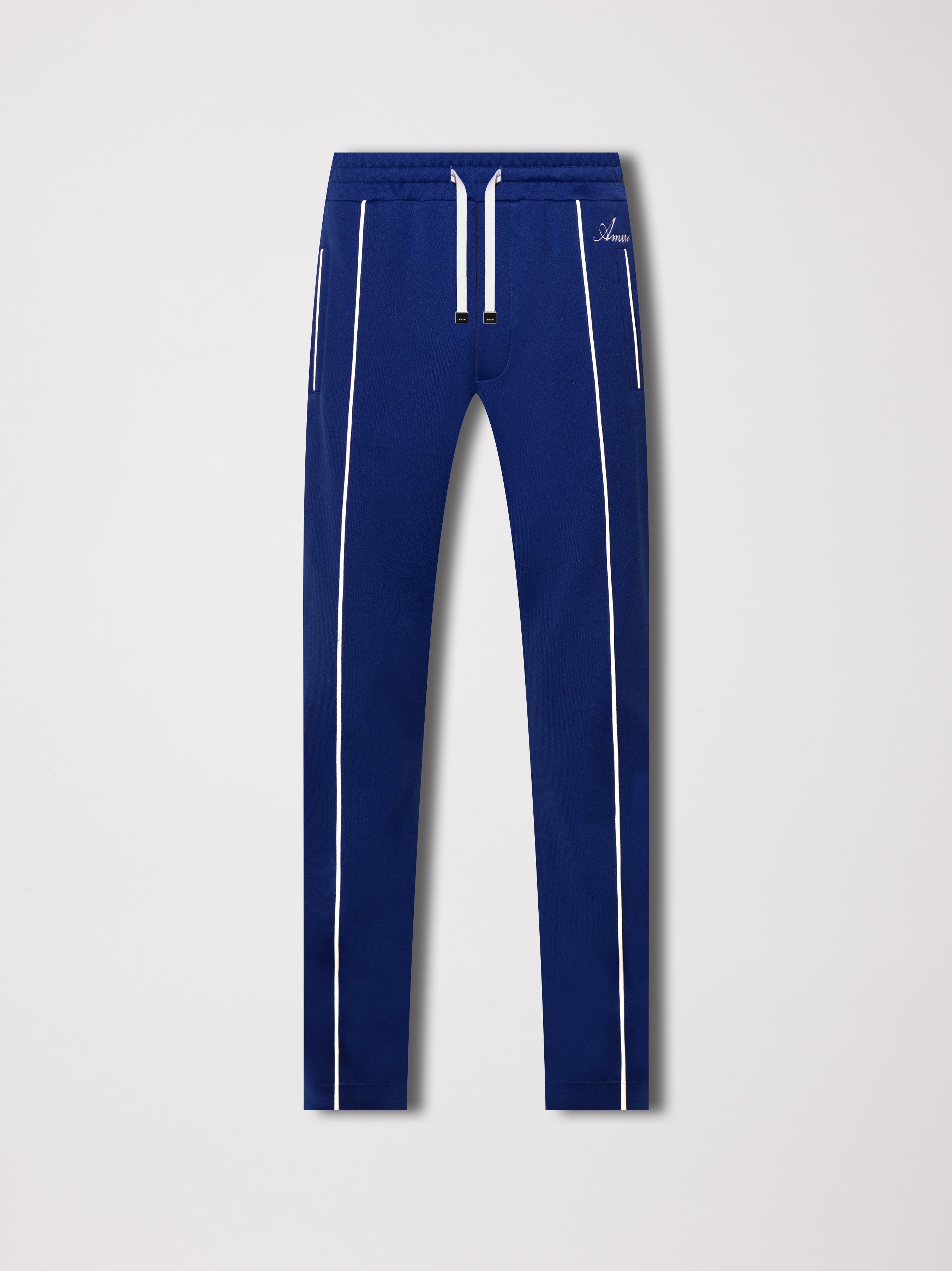 WESTERN TRACK PANTS - BLUE sold by AMIRI