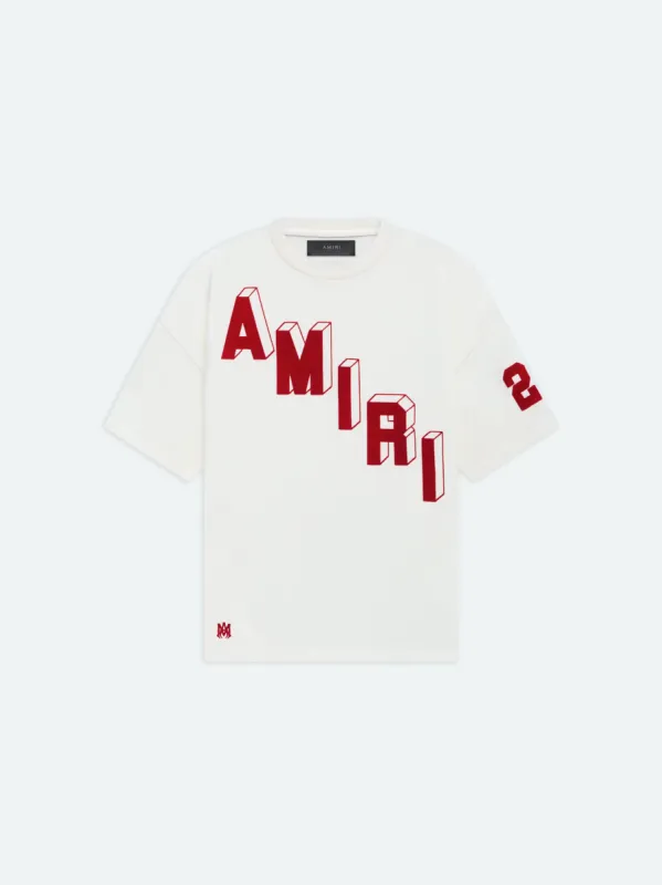 FLOCKED HOCKEY SKATER TEE - VANILLA ICE sold by AMIRI