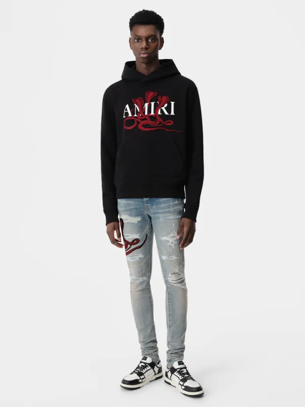 POISON HOODIE - Black Red sold by AMIRI