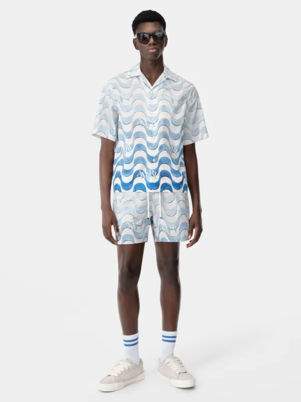 AMIRI STAGGERED SWIM TRUNK - Cerulean sold by AMIRI