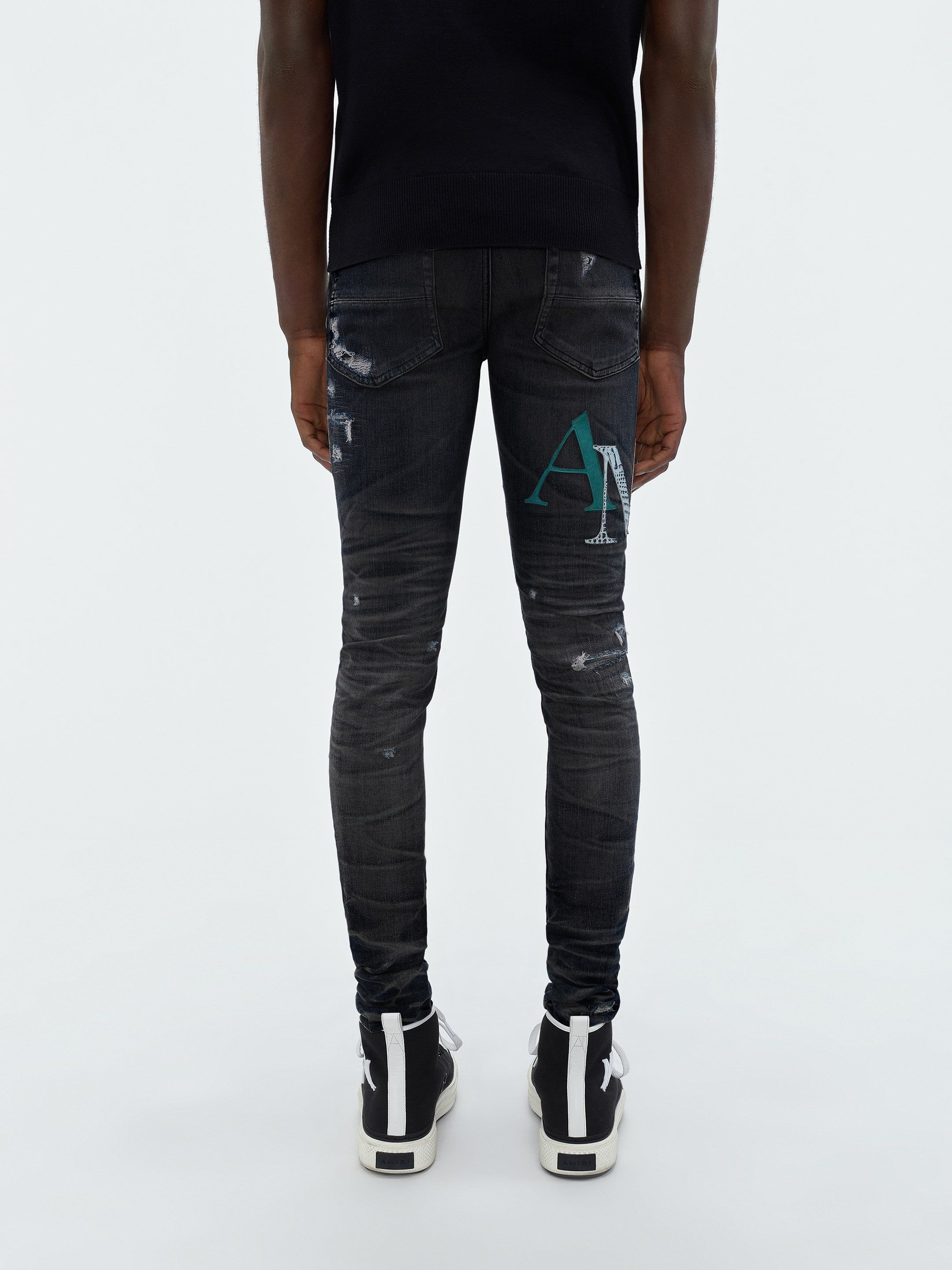 LEATHER STAGGERED LOGO JEAN - FADED BLACK sold by AMIRI product image thumbnail 5